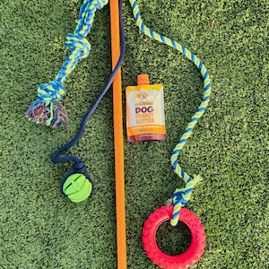 Juguete de arrastre para perros resistente, cuerda, pelota y neumático para entrenamiento de agilidad.
