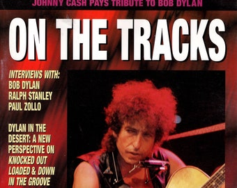 En piste... Le magazine non autorisé de Bob Dylan. Vol 6, numéro 3, 1999.