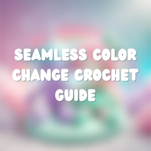 May include: A blurred background with pastel colors of pink, purple, and teal. White text in a bold font reads "SEAMLESS COLOR CHANGE CROCHET GUIDE". The image is likely for a crochet tutorial or pattern.