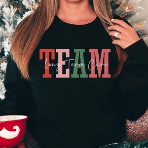 Long Term Care Team Christmas Sweatshirt, Long Term Care Nurse Shirt, LTC CNA Shirt, Registered Nurse Sweatshirt, SNF Sweatshirt, Nurse Gift