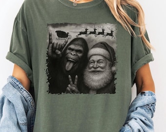 Christmas Sasquatch T-shirt, Funny Bigfoot Shirt, Comfort Colors® Bigfoot Tee, Nature Lover Gift, Cryptid Lover Tshirt, Cryptozoology Shirt