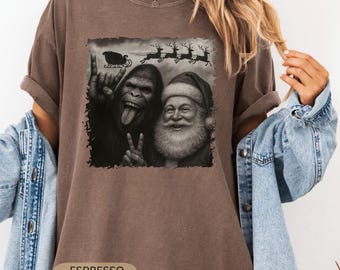 Christmas Sasquatch T-shirt, Funny Bigfoot Shirt, Comfort Colors® Bigfoot Tee, Nature Lover Gift, Cryptid Lover Tshirt, Cryptozoology Shirt