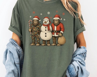 Christmas Sasquatch T-shirt, Funny Bigfoot Shirt, Comfort Colors® Bigfoot Tee, Nature Lover Gift, Cryptid Lover Tshirt, Cryptozoology Shirt