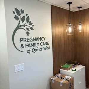 Fully Custom Exterior and Interior store front signage | Professional office and reception signs
