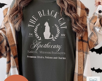 Black Cat Apothecary Halloween T-Shirt, Witchy Comfort Colors Shirt, Salem 1692 Witch Shirt, Spooky Season Gift, Salem Massachusetts Tshirt