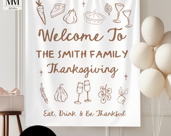 May include: A white Thanksgiving banner with brown text and illustrations of food and drink. The banner reads "Welcome To The Smith Family Thanksgiving" and "Eat, Drink & Be Thankful". A black circle with "CUSTOM" is at the bottom.