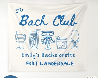 May include: White banner with blue text that reads "The Bach Club" with a line of blue cocktail illustrations below. The text "Emily's Bachelorette FORT LAUDERDALE" is below the illustrations.