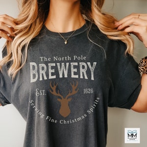 North Pole Brewery Vintage Style Christmas Shirt, Womens Rustic Comfort Colors T-Shirt, Holiday Shirt for Men, Festive Reindeer Shirt Gift