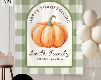 May include: Thanksgiving banner with a watercolor pumpkin illustration. The banner has a green and white checkered background. The text reads "Happy Thanksgiving" and "Smith Family Thanksgiving."