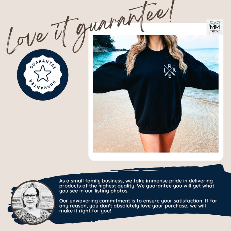K&ouml;nnte beinhalten: Schwarzer Pullover mit einer wei&szlig;en Grafik von gekreuzten Rudern und dem Text "LAKE". Der Pullover wird von einer Person am Strand modelliert.