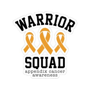 May include: A sticker with the words "WARRIOR SQUAD" in black block letters above three orange awareness ribbons. Below the word "SQUAD" is the text "appendix cancer awareness" in a smaller font.