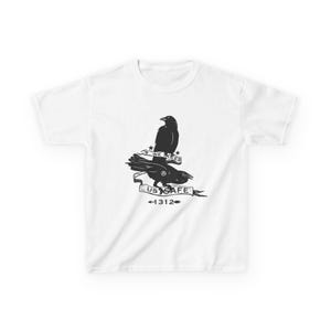May include: White t-shirt featuring a black graphic of two crows, one perched atop the other. The design includes the text "WE KEEP US SAFE" on a banner, with the number "1312" below. The shirt is made of a soft, comfortable material.
