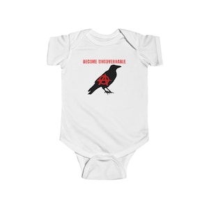 May include: White baby onesie with a black silhouette of a crow with a red anarchy symbol on its chest. The text "Become Ungovernable" is printed in red above the crow.