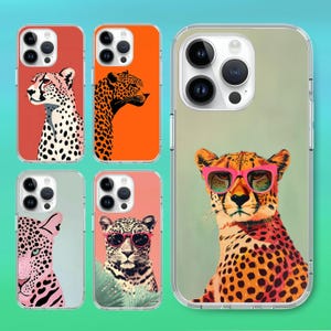 May include: Four phone cases with different cheetah designs. The cases are clear with a black border and feature a cheetah with sunglasses, a cheetah with a pink background, a cheetah with an orange background, and a cheetah with a blue background.