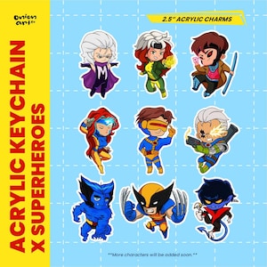 May include: A collection of nine 6.35 cm acrylic charms featuring chibi-style superhero characters. The characters include figures with white hair, red hair, brown hair, blue fur, and yellow masks. The text reads ACRYLIC KEYCHAIN X SUPERHEROES.