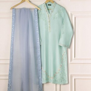 Agha Noor 3 piece Silk Net Embroidered Suit. size- medium. Pista green color