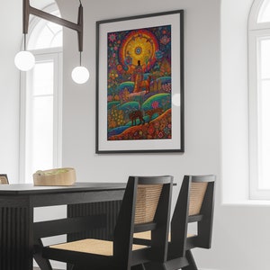 May include: A framed art print with a colourful, detailed landscape featuring a central figure and animals. The artwork has a circular sun-like element and a rich palette of blues, greens, oranges, and yellows, creating a whimsical and detailed scene.