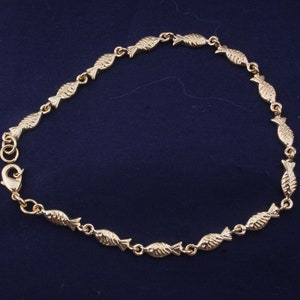 Swimming against Gold plated Brass Fish bracelet. School of fish with golden enameled swimming upstream. Unique jewellery for her Gift Women