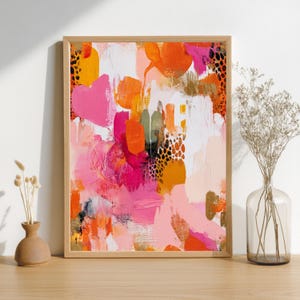 Kleurrijk abstract schilderij in roze en oranje tinten.