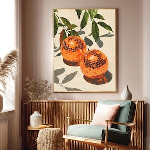 Dopamine decor print met glanzende discobal sinaasappels.