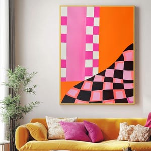 May include: Abstract geometric painting with a pink, orange, and black checkered pattern. The painting is framed in a gold frame.