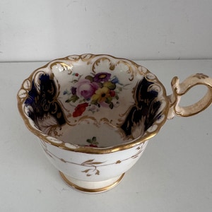Taza de té antigua victoriana