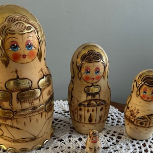 Hand-painted wooden Russian dolls, vintage Matryoshka dolls, 4 pieces