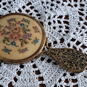 Antique brass art deco hand mirror