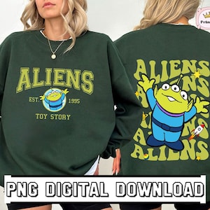 Puede incluir: Sudadera verde con un gráfico de un personaje extraterrestre verde de la película Toy Story. El texto "ALIENS EST. 1995 TOY STORY" está impreso en la parte delantera de la sudadera.