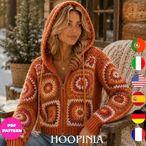 Peut inclure: Une veste à capuche zippée confectionnée à partir de carrés granny au crochet dans des tons orange, marron et crème. Le vêtement présente une fermeture éclair frontale, des manches longues à poignets côtelés, un ourlet côtelé et deux cordons.