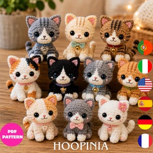 May include: A collection of ten small, handmade crochet cat figurines in various colors and patterns, including tabby, calico, black, white, and gray. Each cat features large black eyes, embroidered facial details, and a small collar with a charm.