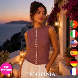 May include: A sleeveless mauve knit top featuring a vertical row of small white buttons down the centre front. The garment has a round neckline and a fitted silhouette, crafted from a textured yarn material that provides a simple and clean look.
