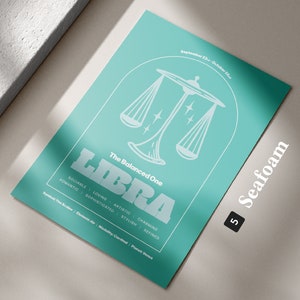 Może przedstawiać: Turkusowy plakat z białym obrysem wagi i słowem "Libra" w pogrubionym białym kolorze. Tekst "The Balanced One" znajduje się nad wagą. Plakat zawiera r&oacute;wnież tekst "September 23rd - October 22nd" i "Seafoam 5".