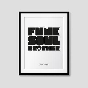May include: Black and white typography print with the text "Funk Soul Brother" and the signature "Fatboy Slim".
