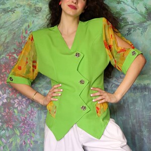 Vintage bright green blouse with colorful seethrough sleeves and statement shoulder pads