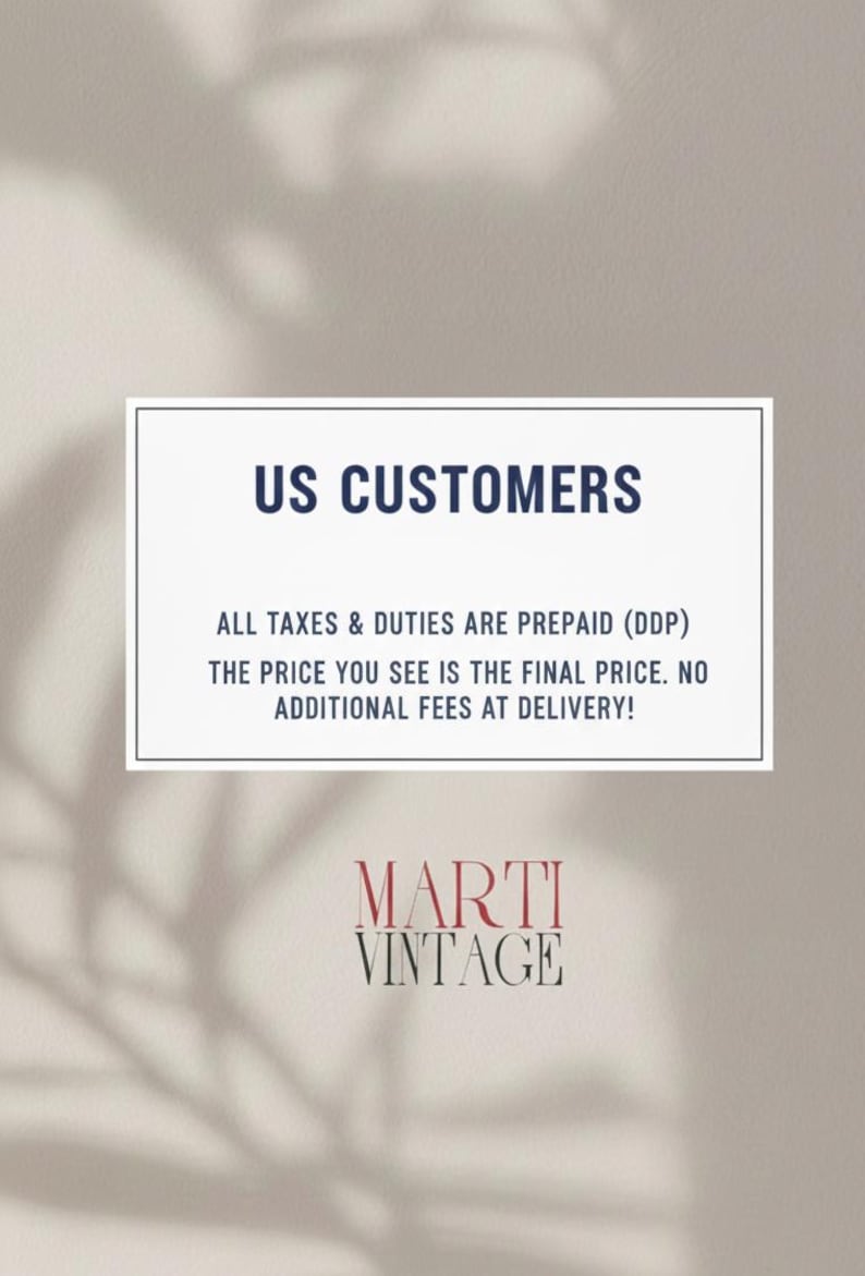 May include: A white rectangular graphic with the text "US CUSTOMERS" in navy blue. Below, the text states that all taxes and duties are prepaid, and the price is final. The Marti Vintage logo is at the bottom.