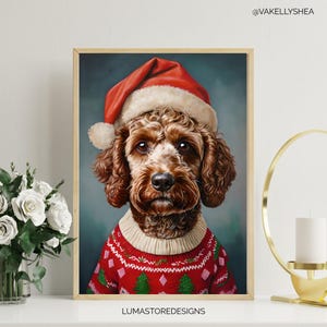 May include: A framed print featuring a dog wearing a Santa hat and a red Christmas sweater with green trees. The dog has brown fur and is set against a teal background. The print has the text "LUMASTOREDESIGNS" at the bottom.