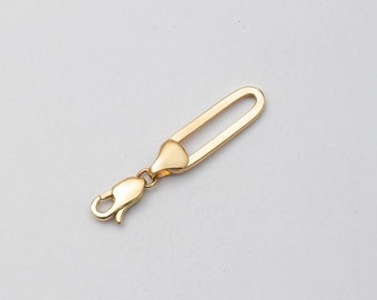 Extensor de corrente em ouro genuíno 14K, projetado para alongar o comprimento de colares e pulseiras. Adicione um extensor robusto como complemento.