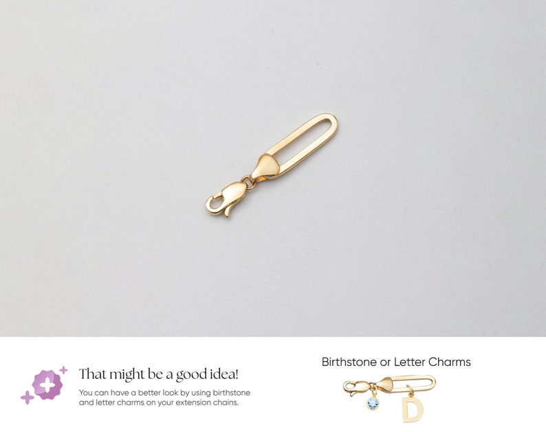 A gold-colored jewelry clasp with a lobster claw clasp and an elongated oval loop. The clasp is designed for attaching to jewelry chains. The image also includes text that says "That might be a good idea!" and "Birthstone or Letter Charms".