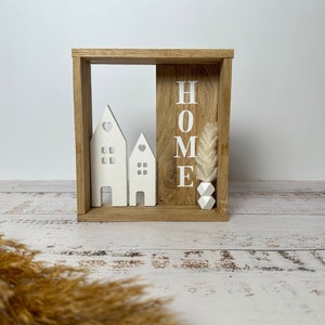 Decorative wooden frame with Raysin house and Home lettering
