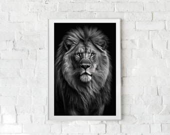 May include: A black and white photograph of a lion's face. The lion is looking directly at the camera with a serious expression. The lion's mane is full and flowing.