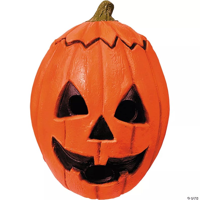 May include: Orange Halloween pumpkin with carved eyes, nose, and a smiling mouth. The pumpkin has a green stem and is a classic decoration for the fall season and Halloween.