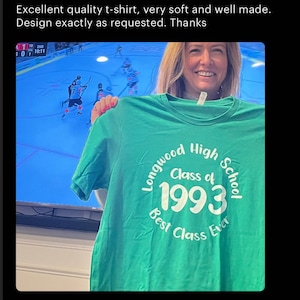 May include: Green t-shirt with white text that reads "Longwood High School Class of 1993 Best Class Ever".