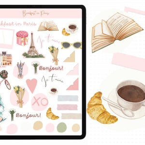 May include: A digital planner page with stickers featuring Parisian themes. The stickers include a croissant, a cup of coffee, a book, a heart, flowers, and the words "Bonjour!" and "Je t'aime".