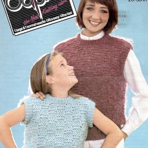 May include: Image of a vintage knitting pattern cover featuring two people wearing knitted vests. The pattern is for a "Diana Brushed Chunky" vest, with measurements of 26-38 inches. The cover includes the text "Odpins" and "Knitting idea".