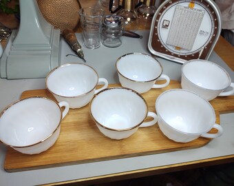 Tazas de té de vidrio con leche y borde dorado de Fire King