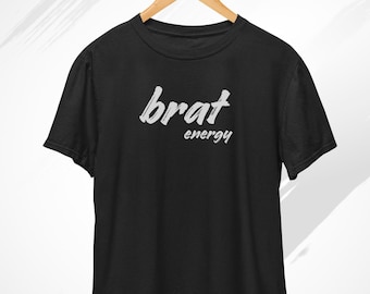 May include: Black t-shirt with white text that says "brat energy".
