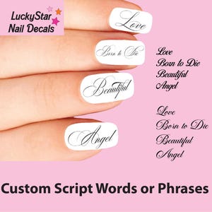 May include: White nail decals featuring black script text including the words Love, Born to Die, Beautiful, and Angel. The decals are displayed on fingernails against a pink background with the text LuckyStar Nail Decals and Custom Script Words or Phrases.