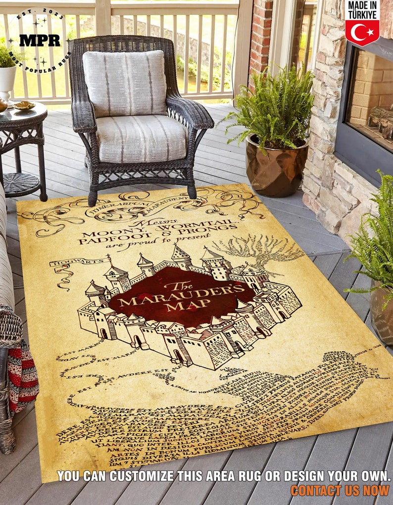 May include: A brown and beige area rug with a map of Hogwarts from the Harry Potter series. The map is titled "The Marauder's Map" and features the names of the Marauders: Moony, Wormtail, Padfoot, and Prongs. The rug is made in Turkey.