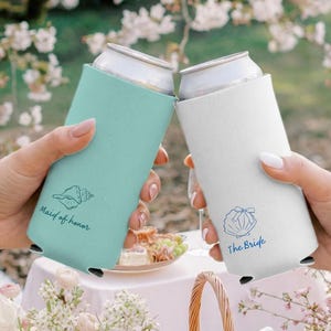May include: A set of three ceramic mugs with a speckled, matte finish. The mugs are in shades of cream, light gray, and dark gray. Each mug has a simple, minimalist design, perfect for coffee or tea.